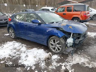 2016 Hyundai Veloster z VIN KMHTC6AD1GU275478, wystawiony jako IAAI lot #41282073 z przebiegiem 128 461 mil mil oraz . Historia ofert i sprzedaży dostępna na DreamBid. Obrazek 1.