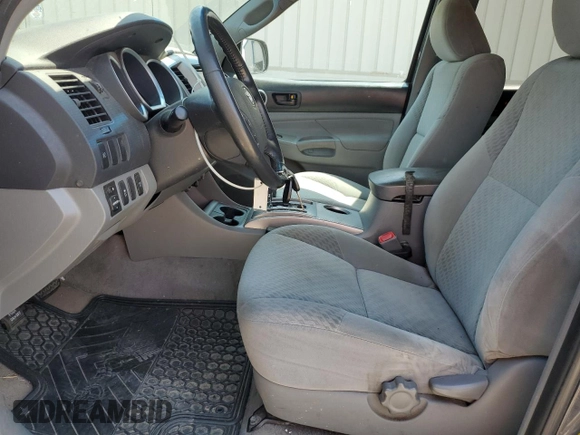 2010 Toyota Tacoma PreRunner with VIN 5TEJU4GNXAZ693226, listed as a Copart auction lot 54715525 with 176,874 mi miles and Salvage Title. Bid and sale history available at DreamBid. Image 7.