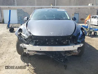 2023 Tesla Model Y Performance with VIN 7SAYGDEF3PF946496, listed as a Copart auction lot 50800315 with 15,077 mi miles and Salvage Title. Bid and sale history available at DreamBid. Image 5.