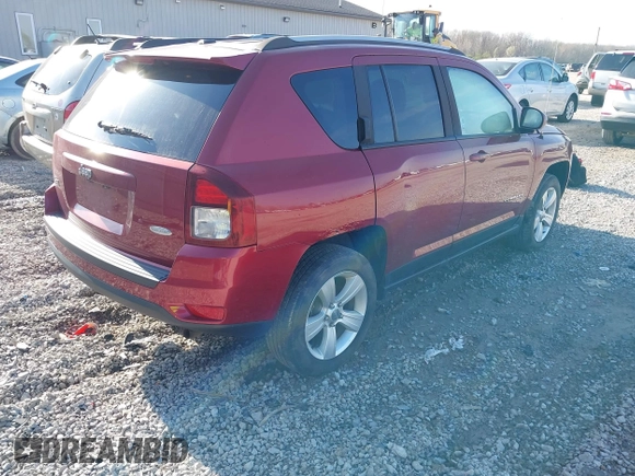 2016 Jeep Compass Latitude with VIN 1C4NJDEBXGD619261, listed as a IAAI auction lot 41991853 with 107,023 mi miles and . Bid and sale history available at DreamBid. Image 4.