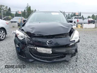 2012 Mazda 5 Grand Touring with VIN JM1CW2DL9C0112005, listed as a IAAI auction lot 42680646 with 140,724 mi miles and . Bid and sale history available at DreamBid. Image 6.
