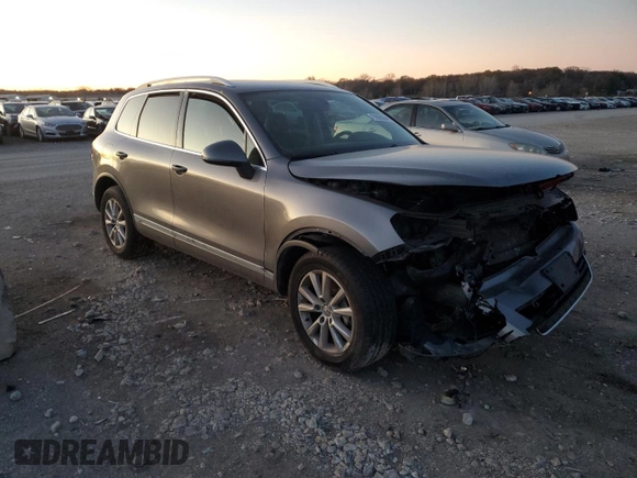 2013 Volkswagen Touareg Lux with VIN WVGEF9BP9DD008935, listed as a Copart auction lot 79859394 with Not Provided miles and Salvage Title. Bid and sale history available at DreamBid. Image 4.