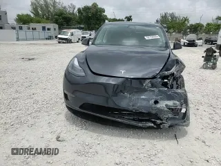 2024 Tesla Model Y Long Range с VIN 7SAYGDEE7RA279293, выставлен на аукционе Copart как лот 62758065 с пробегом 23 271 миль миль и Списание • Salvage title. История ставок и продаж доступна на DreamBid. Изображение 13.