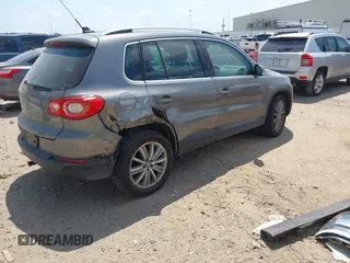2011 Volkswagen Tiguan SEL w/Premium Navi with VIN WVGAV7AX0BW550059, listed as a IAAI auction lot 42071719 with 107,341 mi miles and . Bid and sale history available at DreamBid. Image 4.