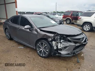 2019 Toyota Camry LE z VIN 4T1B11HK0KU715515, wystawiony jako IAAI lot #42155492 z przebiegiem 114 091 mil mil oraz . Historia ofert i sprzedaży dostępna na DreamBid. Obrazek 1.