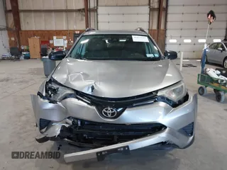 2017 Toyota RAV4 LE with VIN 2T3BFREV6HW642228, listed as a IAAI auction lot 41832543 with 127,830 mi miles. Bid and sale history available at carsss.com. Image 12.