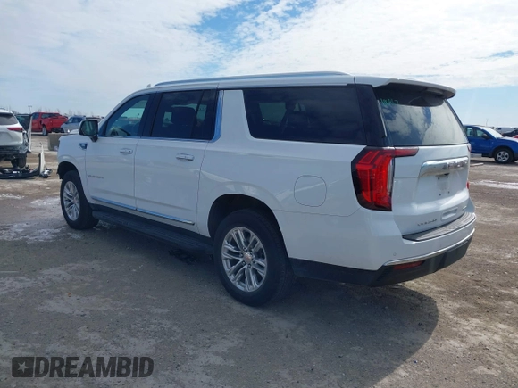 2021 GMC Yukon XL SLT with VIN 1GKS1GKD6MR100561, listed as a IAAI auction lot 41609215 with 37,429 mi miles and . Bid and sale history available at carsss.com. Image 3.