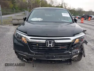 2019 Honda Ridgeline Sport with VIN 5FPYK3F10KB046552, listed as a IAAI auction lot 41983384 with 77,229 mi miles and . Bid and sale history available at DreamBid. Image 12.