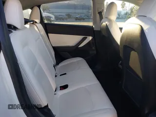 2021 Tesla Model Y Standard Range z VIN 5YJYGDED4MF123311, wystawiony jako IAAI lot #41200519 z przebiegiem 70 190 mil mil oraz . Historia ofert i sprzedaży dostępna na DreamBid. Obrazek 8.