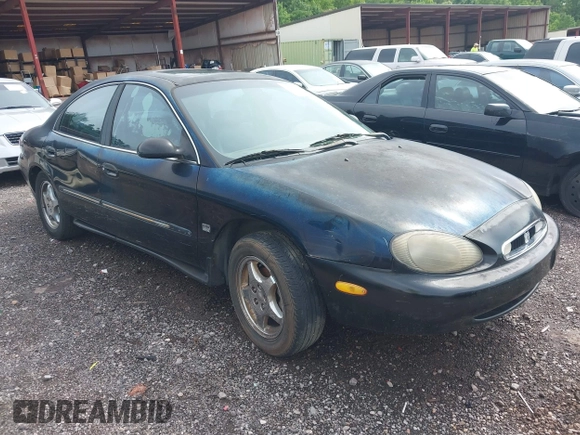 1999 Mercury Sable LS Premium Group z VIN 1MEFM53S7XA632876, wystawiony jako IAAI lot #42303137 z przebiegiem 178 617 mil mil oraz . Historia ofert i sprzedaży dostępna na DreamBid. Obrazek 1.