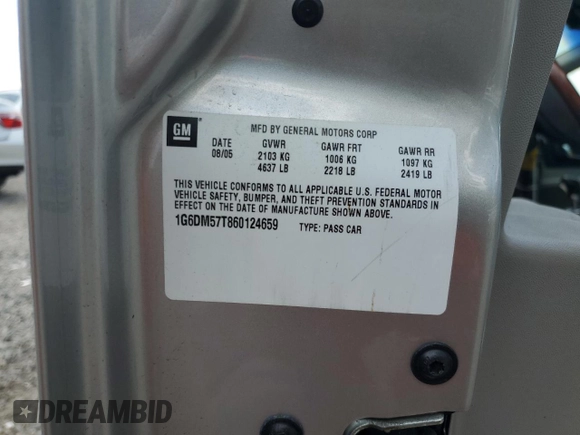 2006 Cadillac CTS with VIN 1G6DM57T860124659, listed as a Copart auction lot 57287985 with 141,162 mi miles and Salvage title. Bid and sale history available at DreamBid. Image 13.