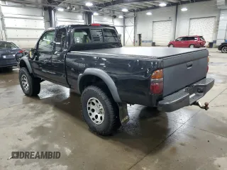 2004 Toyota Tacoma with VIN 5TEWN72N14Z424211, listed as a Copart auction lot 51815615 with 203,415 mi miles and Salvage Title. Bid and sale history available at DreamBid. Image 2.
