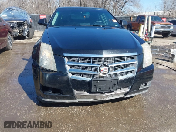 2009 Cadillac CTS AWD z VIN 1G6DH577290166448, wystawiony jako IAAI lot #41751610 z przebiegiem 158 378 mil mil oraz . Historia ofert i sprzedaży dostępna na DreamBid. Obrazek 6.