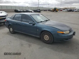 2002 Saturn LS z VIN 1G8JS54F72Y542236, wystawiony jako Copart lot #51253985 z przebiegiem 203 575 mil mil oraz Szkody całkowita. Historia ofert i sprzedaży dostępna na DreamBid. Obrazek 4.