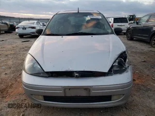 2004 Ford Focus with VIN 3FAFP37Z94R105076, listed as a Copart auction lot 82924224 with 218,253 mi miles and Clean title. Bid and sale history available at DreamBid. Image 5.