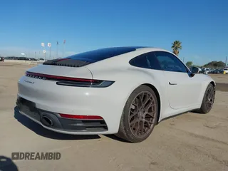 2020 Porsche 911 Carrera S with VIN WP0AB2A90LS226443, listed as a IAAI auction lot 42019338 with 19,734 mi miles and . Bid and sale history available at DreamBid. Image 4.
