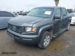 2007 Honda Ridgeline RTL w/Leather with VIN 2HJYK16537H523732, listed as a IAAI auction lot 41798931 with 219,881 mi miles. Bid and sale history available at carsss.com. Image 2.