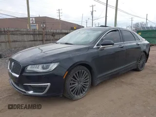 2017 Lincoln MKZ Reserve z VIN 3LN6L5E9XHR649804, wystawiony jako IAAI lot #41906488 z przebiegiem 161 150 mil mil oraz . Historia ofert i sprzedaży dostępna na DreamBid. Obrazek 20.