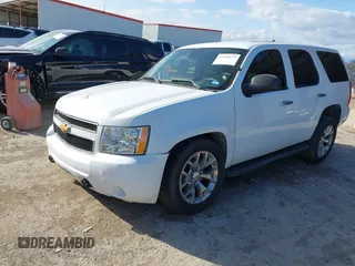 2013 Chevrolet Tahoe Commercial with VIN 1GNLC2E06DR348757, listed as a IAAI auction lot 41711877 with 163,473 mi miles and . Bid and sale history available at DreamBid. Image 2.
