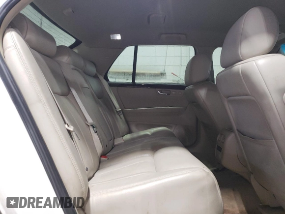 2008 Cadillac DTS 1SA z VIN 1G6KD57YX8U180665, wystawiony jako Copart lot #52109515 z przebiegiem 119 138 mil mil oraz Szkody całkowita. Historia ofert i sprzedaży dostępna na DreamBid. Obrazek 10.
