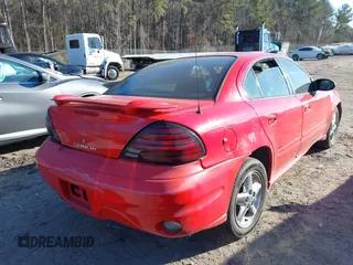 2004 Pontiac Grand Am SE1 with VIN 1G2NF52E84C102696, listed as a IAAI auction lot 41363904 with 217,905 mi miles. Bid and sale history available at carsss.com. Image 4.