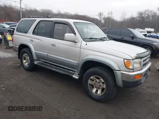 1997 Toyota 4Runner Limited with VIN JT3HN87R6V0092847, listed as a IAAI auction lot 41469151 with 243,105 mi miles. Bid and sale history available at carsss.com. Image 1.