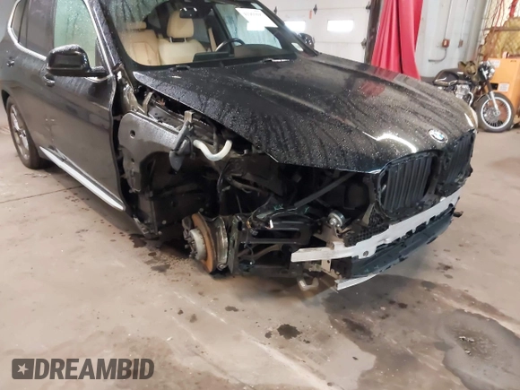 2021 BMW X3 xDrive30i with VIN 5UXTY5C09M9E77981, listed as a IAAI auction lot 41965697 with 61,723 mi miles and . Bid and sale history available at DreamBid. Image 6.