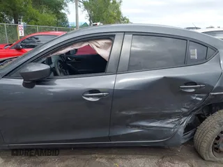 2016 Mazda 3 i Sport with VIN JM1BM1T74G1314329, listed as a IAAI auction lot 42013502 with 97,551 mi miles and . Bid and sale history available at DreamBid. Image 14.