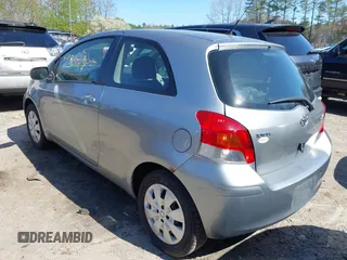 2009 Toyota Yaris with VIN JTDJT903495263456, listed as a IAAI auction lot 42135019 with 219,704 mi miles. Bid and sale history available at carsss.com. Image 3.