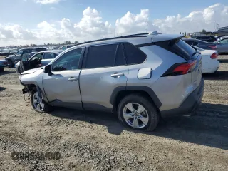 2019 Toyota RAV4 XLE with VIN 2T3W1RFV0KW036705, listed as a Copart auction lot 80983694 with 110,823 mi miles and Salvage Title. Bid and sale history available at carsss.com. Image 2.