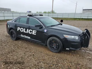 2014 Ford Police Interceptor with VIN 1FAHP2MT9EG111729, listed as a Copart auction lot 56947315 with 74,887 mi miles and Salvage title. Bid and sale history available at DreamBid. Image 4.
