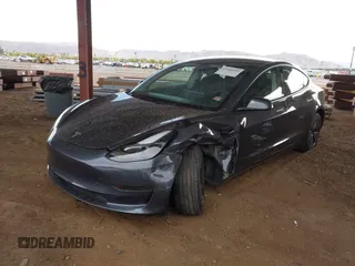 2023 Tesla Model 3 with VIN 5YJ3E1EA6PF655510, listed as a IAAI auction lot 41948480 with 27,179 mi miles and . Bid and sale history available at carsss.com. Image 16.