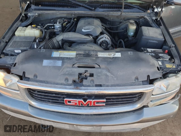 2001 GMC Yukon SLT z VIN 1GKEK13T21J165558, wystawiony jako Copart lot #52200565 z przebiegiem 291 699 mil mil oraz Szkoda całkowita • Salvage title. Historia ofert i sprzedaży dostępna na DreamBid. Obrazek 12.