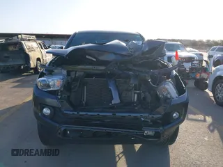 2023 Toyota Tacoma 4WD SR with VIN 3TMCZ5AN7PM587833, listed as a IAAI auction lot 41853887 with 16,532 mi miles. Bid and sale history available at carsss.com. Image 12.