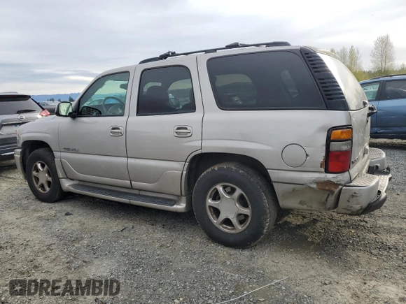 2005 GMC Yukon Denali z VIN 1GKEK63U65J262371, wystawiony jako Copart lot #52773425 z przebiegiem 129 028 mil mil oraz Czysty tytuł • Clean title. Historia ofert i sprzedaży dostępna na DreamBid. Obrazek 2.