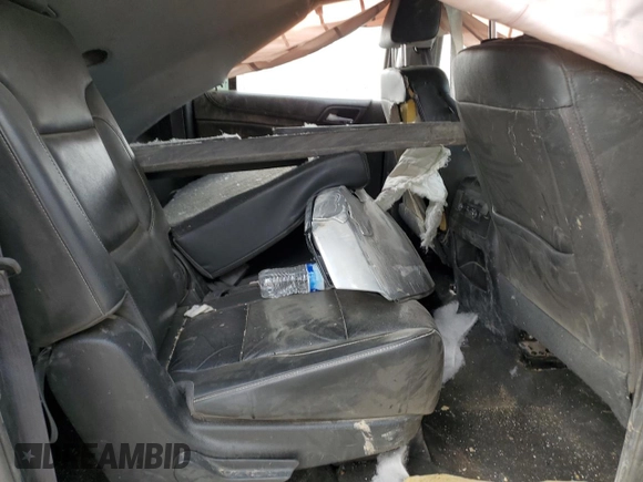 2016 Chevrolet Suburban LT z VIN 1GNSKHKC4GR285212, wystawiony jako Copart lot #58021115 z przebiegiem Nie podano mil oraz Szkoda całkowita • Salvage title. Historia ofert i sprzedaży dostępna na DreamBid. Obrazek 11.