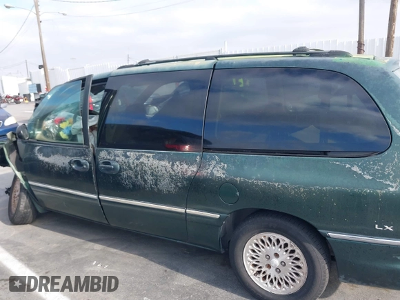 1997 Chrysler Town & Country LXi with VIN 1C4GP54L1VB213059, listed as a IAAI auction lot 39378181 with 1 mi miles. Bid and sale history available at carsss.com. Image 13.