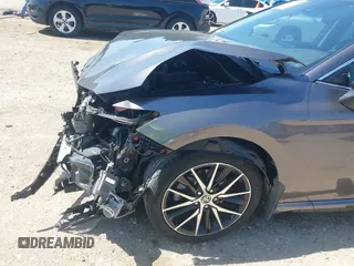2023 Toyota Camry SE z VIN 4T1G11AK3PU735202, wystawiony jako IAAI lot #41874542 z przebiegiem 54 708 mil mil oraz . Historia ofert i sprzedaży dostępna na DreamBid. Obrazek 18.