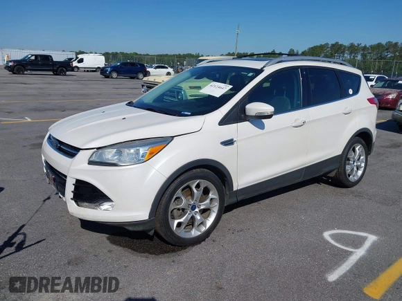 2014 Ford Escape Titanium с VIN 1FMCU0J94EUB92694, выставлен на аукционе IAAI как лот 42124647 с пробегом 107 666 миль миль и . История ставок и продаж доступна на DreamBid. Изображение 2.