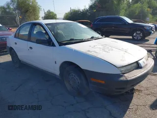 1998 Saturn SL z VIN 1G8ZG5283WZ233209, wystawiony jako IAAI lot #40997373 z przebiegiem 240 385 mil mil oraz . Historia ofert i sprzedaży dostępna na DreamBid. Obrazek 1.