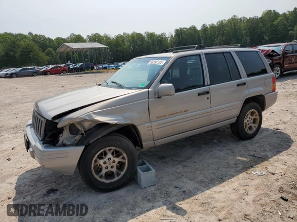 1998 Jeep Grand Cherokee Limited with VIN 1J4GZ78Y5WC324828, listed as a Copart auction lot 58992125 with 225,705 mi miles and Salvage title. Bid and sale history available at DreamBid. Image 1.