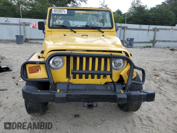 2000 Jeep Wrangler Sport with VIN 1J4FA49SXYP789791, listed as a Copart auction lot 60538875 with Not provided miles and Salvage title. Bid and sale history available at DreamBid. Image 5.