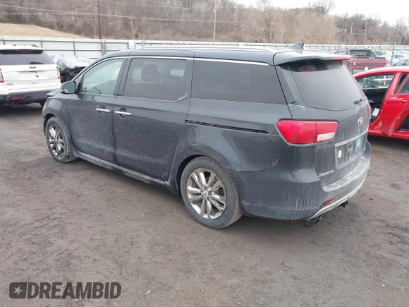 2016 Kia Sedona SX-L with VIN KNDME5C13G6112674, listed as a IAAI auction lot 41711275 with 154,337 mi miles and . Bid and sale history available at carsss.com. Image 3.