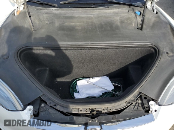 2019 Tesla Model S 100D with VIN 5YJSA1E44KF335113, listed as a Copart auction lot 82936844 with 89,770 mi miles and Salvage title. Bid and sale history available at DreamBid. Image 11.