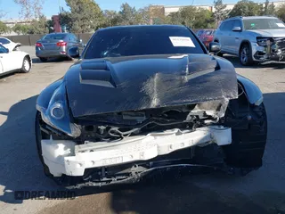 2009 Nissan 370Z Touring with VIN JN1AZ44E39M408668, listed as a IAAI auction lot 41231840 with 93,826 mi miles and . Bid and sale history available at DreamBid. Image 6.