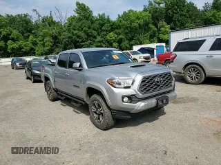 2020 Toyota Tacoma SR5 z VIN 3TMCZ5AN7LM302123, wystawiony jako Copart lot #57299805 z przebiegiem 43 244 mil mil oraz Szkoda całkowita • Salvage title. Historia ofert i sprzedaży dostępna na DreamBid. Obrazek 13.