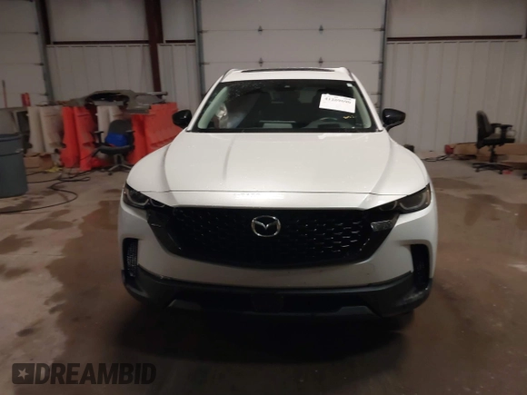 2023 Mazda CX-50 S Premium Plus with VIN 7MMVABEMXPN139186, listed as a IAAI auction lot 41289690 with 26,556 mi miles and . Bid and sale history available at DreamBid. Image 12.