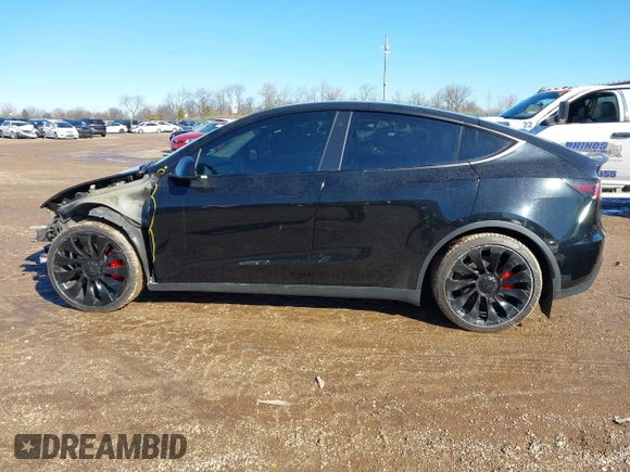 2022 Tesla Model Y Performance with VIN 7SAYGDEFXNF313636, listed as a IAAI auction lot 41660019 with 30,258 mi miles and . Bid and sale history available at DreamBid. Image 15.