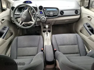2010 Honda Insight EX with VIN JHMZE2H71AS039108, listed as a Copart auction lot 54557145 with 151,230 mi miles and Salvage title. Bid and sale history available at DreamBid. Image 8.