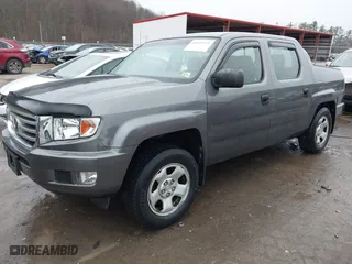 2012 Honda Ridgeline RT with VIN 5FPYK1F24CB456298, listed as a IAAI auction lot 40869948 with 123,329 mi miles. Bid and sale history available at carsss.com. Image 18.
